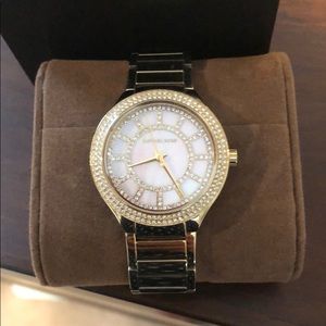 Gold with pearl face Michael Kors watch
